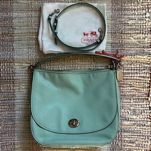 Coach pebbled leather crossbody bag, mint/robin’s egg with dust bag